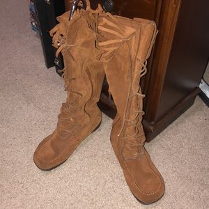 Stylish brown leather moccasin boots